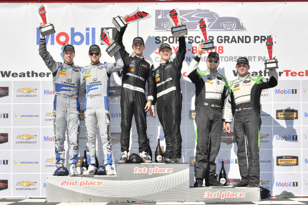 #33 Riley Motorsports Mercedes AMG GT3, GTD: Jeroen Bleekemolen, Ben Keating celebrates the win in Victory Lane on the podium with #14 3GT Racing Lexus RCF GT3, GTD: Dominik Baumann, Kyle Marcelli, #44 Magnus Racing Audi R8 LMS GT3, GTD: John Potter, Andy Lally #33 Riley Motorsports Mercedes AMG GT3, GTD: Jeroen Bleekemolen, Ben Keating celebrates the win in Victory Lane on the podium with #14 3GT Racing Lexus RCF GT3, GTD: Dominik Baumann, Kyle Marcelli, #44 Magnus Racing Audi R8 LMS GT3, GTD: John Potter, Andy Lally