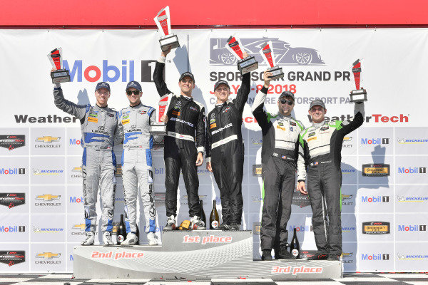 #33 Riley Motorsports Mercedes AMG GT3, GTD: Jeroen Bleekemolen, Ben Keating celebrates the win in Victory Lane on the podium with #14 3GT Racing Lexus RCF GT3, GTD: Dominik Baumann, Kyle Marcelli, #44 Magnus Racing Audi R8 LMS GT3, GTD: John Potter, Andy Lally