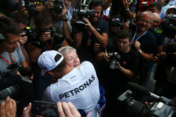Autodromo Hermanos Rodriguez, Mexico City, Mexico.
Sunday 29 October 2017.
Lewis Hamilton, Mercedes AMG, celebrates with his mum Carmen Larbalestier, surrounded by photographers and media,after securing his 4th world drivers championship title, and third with Mercedes.
World Copyright: Charles Coates/LAT Images
ref: Digital Image DJ5R7919 Autodromo Hermanos Rodriguez, Mexico City, Mexico.
Sunday 29 October 2017.
Lewis Hamilton, Mercedes AMG, celebrates with his mum Carmen Larbalestier, surrounded by photographers and media,after securing his 4th world drivers championship title, and third with Mercedes.
World Copyright: Charles Coates/LAT Images
ref: Digital Image DJ5R7919