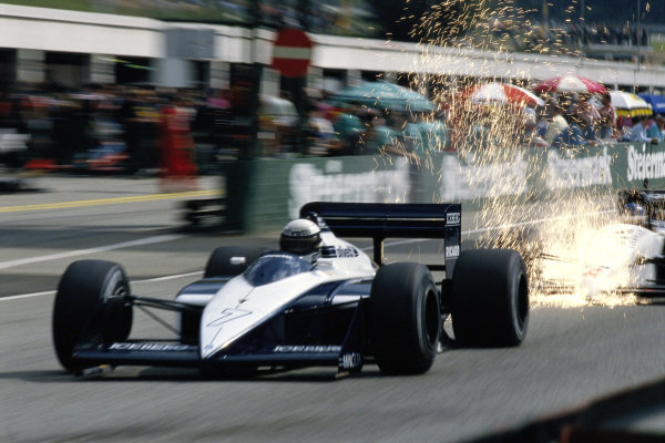 Riccardo Patrese, Brabham BT56 BMW, with sparks flying into the following Philippe Streiff, Tyrrell DG016 Ford.