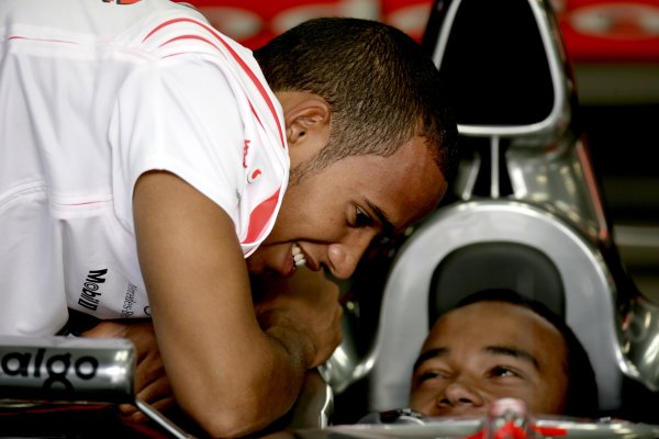 2007 Italian Grand Prix
Autodromo di Monza, Monza, Italy.
7th - 9th September 2007.
Lewis Hamilton with brother Nicolas sitting in the cockpit of the McLaren MP4-22 Mercedes. Portrait.
World Copyright: Andrew Ferraro/LAT Photographic
ref: Digital Image VY9E9630