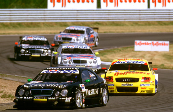 2001 DTM Championship
Oscersleben, Germany. 19th - 20th May 2001.
At the start of the race, Marcel Fassler, (AMG Mercedes-Benz CLK), leads the Audi of Laurent Aiello and Bernd Schneider - action.
World Copyright: Peter Spinney/LAT Photographic
ref: 35mm Image A02