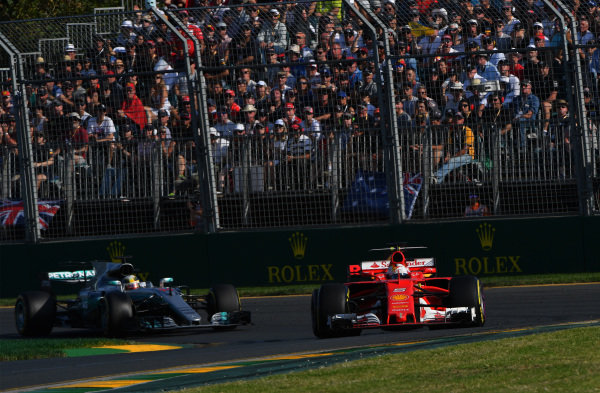 Sebastian Vettel (GER) Ferrari SF70-H leads Lewis Hamilton (GBR) Mercedes-Benz F1 W08 Hybrid Sebastian Vettel (GER) Ferrari SF70-H leads Lewis Hamilton (GBR) Mercedes-Benz F1 W08 Hybrid at Formula One World Championship, Rd1, Australian Grand Prix, Race, Albert Park, Melbourne, Australia, Sunday 26 March 2017.