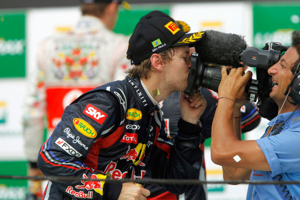 Interlagos, Sao Paulo, Brazil.
27th November 2011.
Sebastian Vettel, Red Bull Racing RB7 Renault gives the camera a kiss after the race.
World Copyright:Andrew Ferraro/LAT Photographic
ref: Digital Image _Q0C6532 Interlagos, Sao Paulo, Brazil.
27th November 2011.
Sebastian Vettel, Red Bull Racing RB7 Renault gives the camera a kiss after the race.
World Copyright:Andrew Ferraro/LAT Photographic
ref: Digital Image _Q0C6532