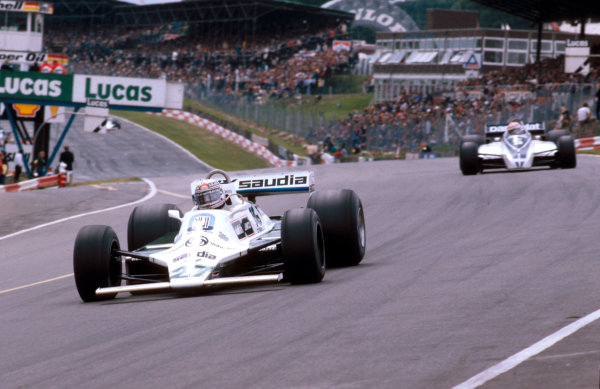 1980 British Grand Prix.
Brands Hatch, England.
11-13 July 1980.
Alan Jones (Williams FW07B Ford) 1st position at Paddock Hill Bend, with Nelson Piquet (Brabham BT49 Ford) behind.
Ref-80 GB 17.
World Copyright - LAT Photographic

