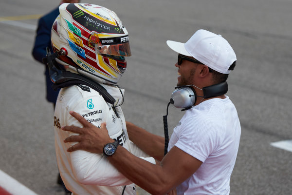 Circuit of the Americas, Austin, Texas, United States of America.
Saturday 21 October 2017.
Lewis Hamilton, Mercedes AMG, celebrates with his brother Nick, after securing pole position.
World Copyright: Steve Etherington/LAT Images 
ref: Digital Image SNE18979