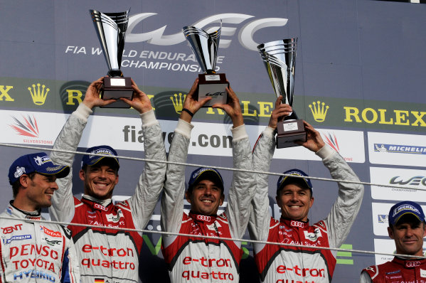 Silverstone, England. 24th - 26th August 2012. Rd 4.
Alexander Wurz, Toyota Racing, Toyota TS030 Hybrid, Andre Lotterer (GER), Marcel Fassler (CHE), Benoit Treluyer (FRA), Audi Sport Team Joest, Audi R18 E-Tron Quatrro, Portrait, Podium, 
World Copyright: Chris Bird/LAT Photographic.
Ref:  _CJB8610