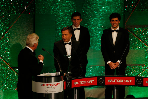 2014 Autosport Awards.
Grosvenor House Hotel, Park Lane, London.
Sunday 7 December 2014.
Max Verstappen and Carlos Sainz Jr present the Rally Car of the Year award to Jost Capito for the Volkswagen Polo R WRC.
World Copyright: Sam Bloxham/LAT Photographic.
ref: Digital Image _14P3853