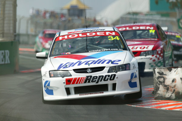 2003 Australian V8 Supercars
Surfers Paradise, Australia. October 25th 2003.
Garth Tander leads Steven Richards during the Gillette V8 Supercar event at the Lexmark Indy 300 at the Sufer's Paradise street circuit.
World Copyright: Mark Horsburgh/LAT Photographic
ref: Digital Image Only 2003 Australian V8 Supercars
Surfers Paradise, Australia. October 25th 2003.
Garth Tander leads Steven Richards during the Gillette V8 Supercar event at the Lexmark Indy 300 at the Sufer's Paradise street circuit.
World Copyright: Mark Horsburgh/LAT Photographic
ref: Digital Image Only