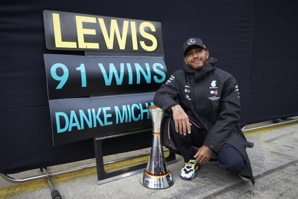 Lewis Hamilton, Mercedes-AMG Petronas F1, 1st position, celebrates after securing his 91st F1 race win, equalling the record of Michael Schumacher