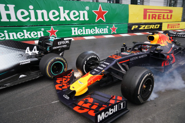 Max Verstappen, Red Bull Racing RB15, makes contact with leader Lewis Hamilton, Mercedes AMG F1 W10, in the closing stages of the race Max Verstappen, Red Bull Racing RB15, makes contact with leader Lewis Hamilton, Mercedes AMG F1 W10, in the closing stages of the race