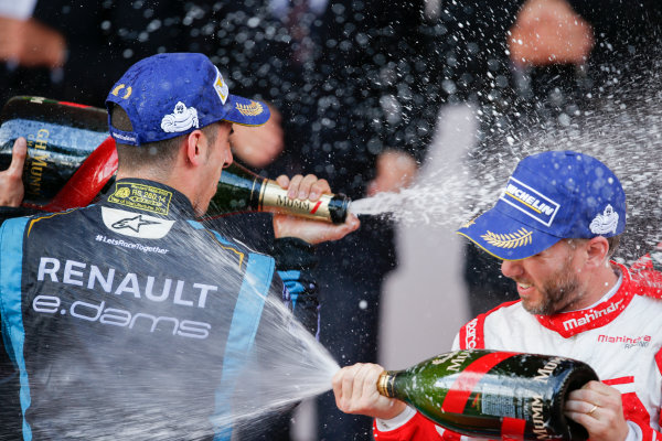 2016/2017 FIA Formula E Championship.
Monte-Carlo, Monaco
Saturday 13 May 2017.
Sebastien Buemi (SUI), Renault e.Dams, Spark-Renault, Renault Z.E 16, sprays the champagne on the podium with Nick Heidfeld (GER), Mahindra Racing, Spark-Mahindra, Mahindra M3ELECTRO.
Photo: Alastair Staley/LAT/Formula E
ref: Digital Image _X0W1395