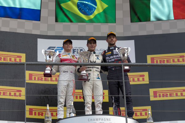 2017 FIA Formula 2 Round 8.
Spa-Francorchamps, Spa, Belgium.
Sunday 27 August 2017.
Sergio Sette Camara (BRA, MP Motorsport) celebrates his victory on the podium with Nyck De Vries (NED, Racing Engineering) and Luca Ghiotto (ITA, RUSSIAN TIME).
Photo: Alastair Staley/FIA Formula 2.
ref: Digital Image _L5R6107 2017 FIA Formula 2 Round 8.
Spa-Francorchamps, Spa, Belgium.
Sunday 27 August 2017.
Sergio Sette Camara (BRA, MP Motorsport) celebrates his victory on the podium with Nyck De Vries (NED, Racing Engineering) and Luca Ghiotto (ITA, RUSSIAN TIME).
Photo: Alastair Staley/FIA Formula 2.
ref: Digital Image _L5R6107