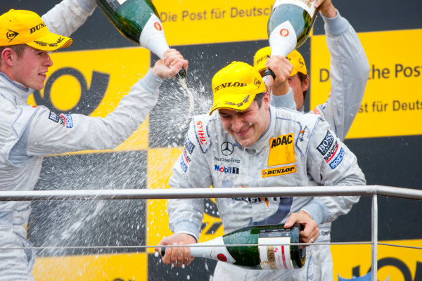 Dijon - Prenois, France. Sunday 11th October. 
Gary Paffett (Salzgitter AMG Mercedes C-Klasse) celebrates his victory on the podium with Paul Di Resta (AMG Mercedes C-Klasse) and Bruno Spengler (Mercedes-Benz Bank AMG C-Klasse). 
World Copyright: Alastair Staley/LAT Photographic.
Ref: _O9T0732
jpg