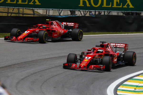 Sebastian Vettel, Ferrari SF71H and Kimi Raikkonen, Ferrari SF71H