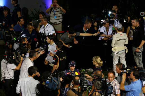 Marina Bay Circuit, Singapore.
Saturday 21st September 2013.
Nico Rosberg, Mercedes AMG, Sebastian Vettel, Red Bull Racing, and Romain Grosjean, Lotus F1, talk to the media after qualifying.
World Copyright: Charles Coates/LAT Photographic.
ref: Digital Image _N7T5502 Marina Bay Circuit, Singapore.
Saturday 21st September 2013.
Nico Rosberg, Mercedes AMG, Sebastian Vettel, Red Bull Racing, and Romain Grosjean, Lotus F1, talk to the media after qualifying.
World Copyright: Charles Coates/LAT Photographic.
ref: Digital Image _N7T5502