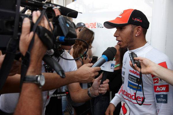 Interlagos, Sao Paulo, Brazil.
27th November 2011.
Lewis Hamilton, McLaren MP4-26 Mercedes, retired, is interviewed after retiring from the race. Portrait. Media. 
World Copyright: Steve Etherington/LAT Photographic
ref: Digital Image SNE28265