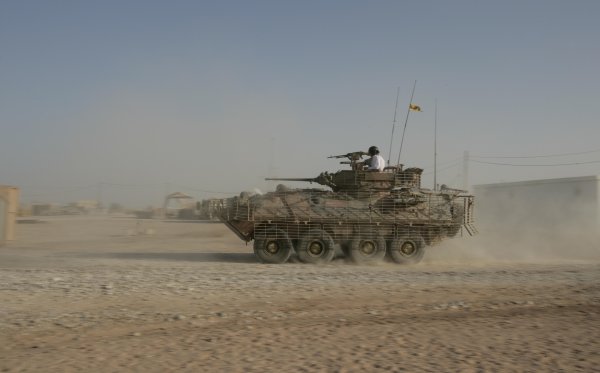 2007 Australian V8 Supercars.
Bahrain International Circuit. Sakhir, Bahrain.
2nd - 4th November.
Craig Lowndes and Jason Bright at the wheel of armored troop carriers during a visit to the Australian troops based at Tallil Airbase located approximately 310 kilometers Southeast of Baghdad, Iraq.
World Copyright: Mark Horsburgh/LAT Photographic.
Ref: Digital Image V8-Drivers-IRAQ-7447 2007 Australian V8 Supercars.
Bahrain International Circuit. Sakhir, Bahrain.
2nd - 4th November.
Craig Lowndes and Jason Bright at the wheel of armored troop carriers during a visit to the Australian troops based at Tallil Airbase located approximately 310 kilometers Southeast of Baghdad, Iraq.
World Copyright: Mark Horsburgh/LAT Photographic.
Ref: Digital Image V8-Drivers-IRAQ-7447