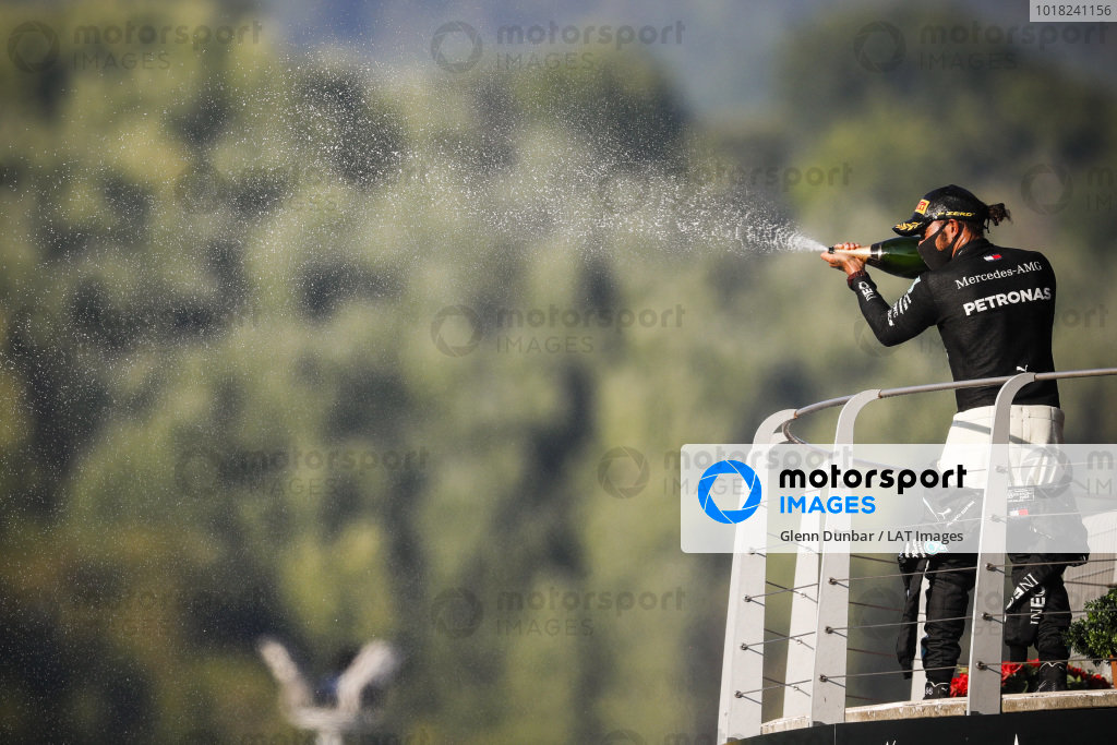 Lewis Hamilton, Mercedes-AMG Petronas F1, 1st position, sprays Champagne from the podium Lewis Hamilton, Mercedes-AMG Petronas F1, 1st position, sprays Champagne from the podium