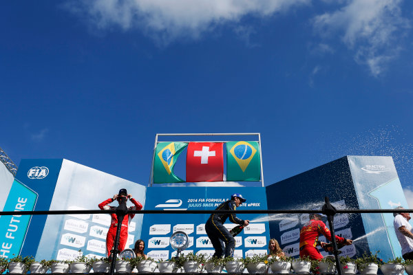 2014 FIA Formula E Championship.
Punta del Este ePrix, Uruguay.
Podium. Sebastien Buemi (SWI)/E.dams Renault - Spark-Renault SRT_01E (first position), Nelson Piquet Jr (BRA)/China Racing - Spark-Renault SRT_01E (second position) and Lucas di Grassi (BRA)/Audi Abt Sport - Spark-Renault SRT_01E (third position).
Photo: Zak Mauger/LAT/FE
ref: Digital Image _L0U1962 2014 FIA Formula E Championship.
Punta del Este ePrix, Uruguay.
Podium. Sebastien Buemi (SWI)/E.dams Renault - Spark-Renault SRT_01E (first position), Nelson Piquet Jr (BRA)/China Racing - Spark-Renault SRT_01E (second position) and Lucas di Grassi (BRA)/Audi Abt Sport - Spark-Renault SRT_01E (third position).
Photo: Zak Mauger/LAT/FE
ref: Digital Image _L0U1962