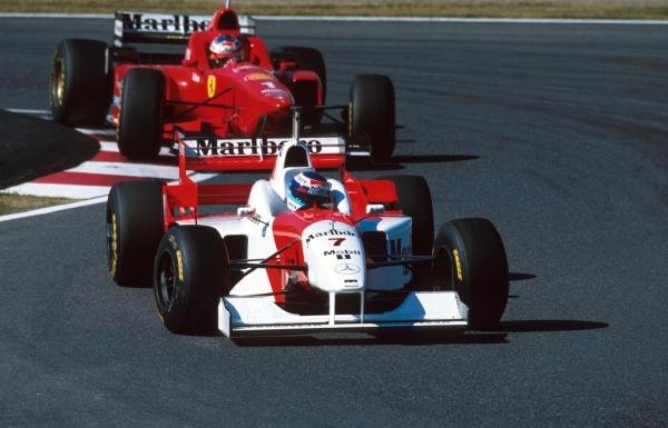 Mika Hakkinen(FIN) Mclaren  MP4-11 leads Schumacher
Japanese Grand Prix, Suzuka, 13th October 1996