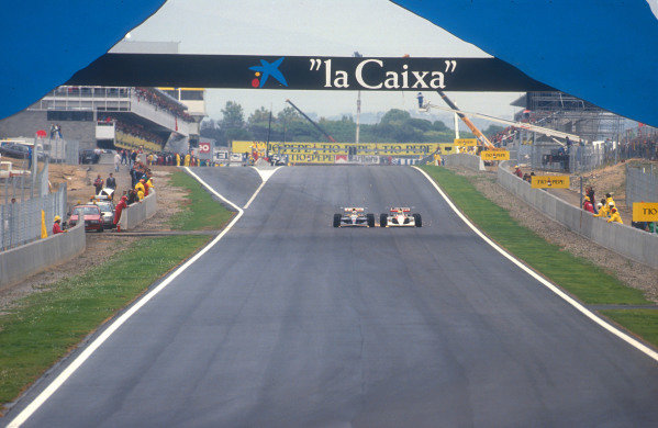1991 Spanish Grand Prix.Catalunya, Barcelona, Spain.27-29 September 1991.Nigel Mansell (Williams FW14 Renault) battles wheel to wheel with Ayrton Senna (McLaren MP4/6 Honda) down the full length of the start/finish straight before overtaking him into turn 1 for 2nd place. They finished in 1st and 5th positions respectively.Ref-91 ESP 03.World Copyright - LAT Photographic 1991 Spanish Grand Prix.Catalunya, Barcelona, Spain.27-29 September 1991.Nigel Mansell (Williams FW14 Renault) battles wheel to wheel with Ayrton Senna (McLaren MP4/6 Honda) down the full length of the start/finish straight before overtaking him into turn 1 for 2nd place. They finished in 1st and 5th positions respectively.Ref-91 ESP 03.World Copyright - LAT Photographic