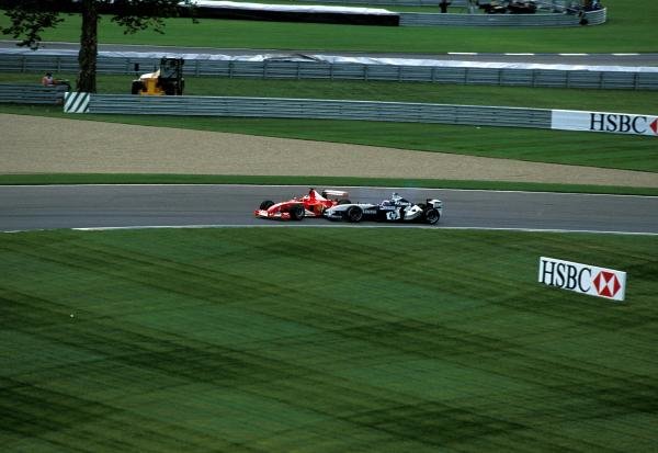 Juan Pablo Montoya (COL), BMW Williams FW25, and Rubens Barrichello (BRA), Ferrari F2003-GA, head into turn 1 side by side where they made contact. Barrichello entered the gravel trap backwards and retired from the race while Montoya was handed a drive through penalty.
United States Grand Prix, Rd15, Indianapolis Motor Speedway, Indianapolis, USA. 28 September 2003.
BEST IMAGE Juan Pablo Montoya (COL), BMW Williams FW25, and Rubens Barrichello (BRA), Ferrari F2003-GA, head into turn 1 side by side where they made contact. Barrichello entered the gravel trap backwards and retired from the race while Montoya was handed a drive through penalty.
United States Grand Prix, Rd15, Indianapolis Motor Speedway, Indianapolis, USA. 28 September 2003.
BEST IMAGE