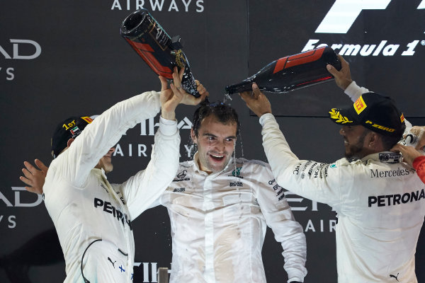 Yas Marina Circuit, Abu Dhabi, United Arab Emirates.
Sunday 26 November 2017.
Lewis Hamilton, Mercedes AMG, 2nd Position, and Valtteri Bottas, Mercedes AMG, 1st Position, celebrate on the podium.
World Copyright: /LAT Images
ref: Digital Image SNE13330 Yas Marina Circuit, Abu Dhabi, United Arab Emirates.
Sunday 26 November 2017.
Lewis Hamilton, Mercedes AMG, 2nd Position, and Valtteri Bottas, Mercedes AMG, 1st Position, celebrate on the podium.
World Copyright: /LAT Images
ref: Digital Image SNE13330