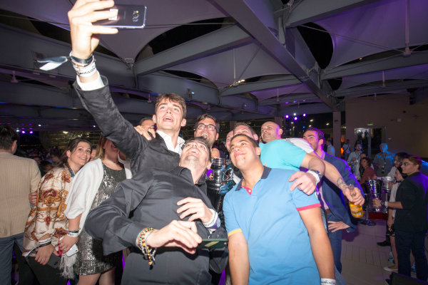 2017 Awards Evening.
Yas Marina Circuit, Abu Dhabi, United Arab Emirates.
Sunday 26 November 2017.
Charles Leclerc (MCO, PREMA Racing), celebrates with team.
Photo: Zak Mauger/FIA Formula 2/GP3 Series.
ref: Digital Image _X0W0252