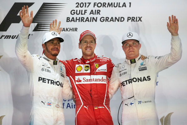 Bahrain International Circuit, Sakhir, Bahrain.
Sunday 16 April 2017.
Lewis Hamilton, Mercedes AMG, 2nd Position, Sebastian Vettel, Ferrari, 1st Position, and Valtteri Bottas, Mercedes AMG, 3rd Position, on the podium.
World Copyright: Steve Etherington/LAT Images
ref: Digital Image SNE23064 Bahrain International Circuit, Sakhir, Bahrain.
Sunday 16 April 2017.
Lewis Hamilton, Mercedes AMG, 2nd Position, Sebastian Vettel, Ferrari, 1st Position, and Valtteri Bottas, Mercedes AMG, 3rd Position, on the podium.
World Copyright: Steve Etherington/LAT Images
ref: Digital Image SNE23064