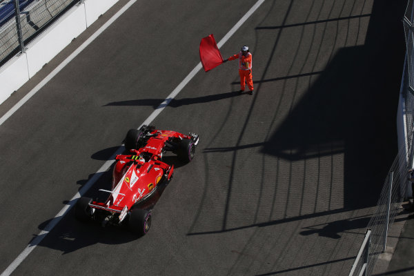 Sochi Autodrom, Sochi, Russia.
Friday 28 April 2017.
A marshal tries, unsuccessfully, to stop Kimi Raikkonen, Ferrari SF70H, from leaving the pit lane at the end of the session.
World Copyright: Coates/LAT Images
ref: Digital Image AN7T1141